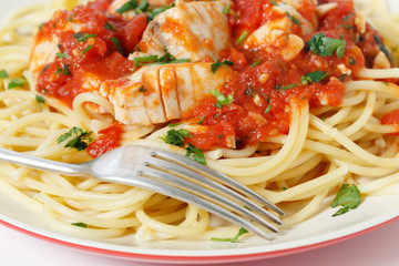 Spaghetti fish fork and arrabbiata sauce