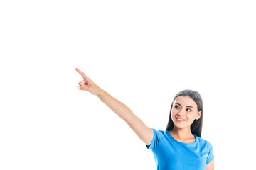 portrait of attractive cheerful woman pointing away isolated on white