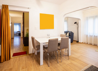 Entry with table, chairs and armchair