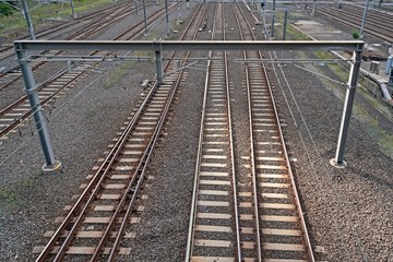 Fototapeta premium TOP view on Railroad Tracks, Cargo train platform. Empty Railways , freight train railway carriag.