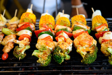 Grilled pork with BBQ sauce on sticks, thailand street food