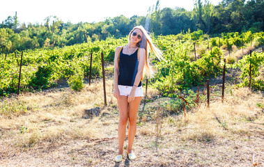 Beautiful blonde in the vineyards