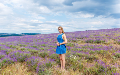 Beautiful girl on the lavender field