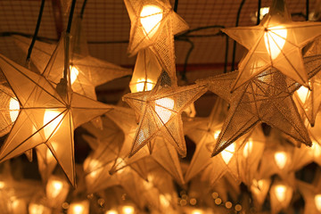 Star lantern lights hanging during holiday season.