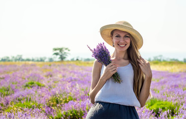 Beautiful girl on the lavender field