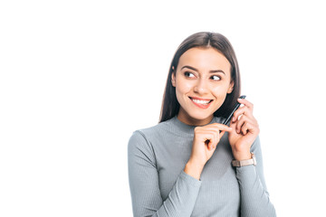 portrait of young cunning woman with pen isolated on white