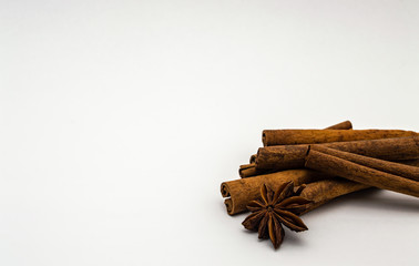 sticks of cinnamon star anise Brown isolate on a white background close-up