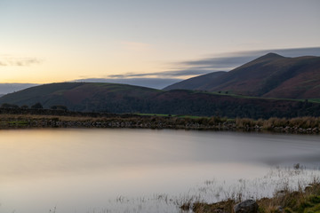 Obraz premium Zachód słońca nad Tewet Tarn