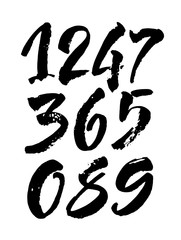 set of calligraphic acrylic or ink numbers. ABC for your design, brush lettering on a black background