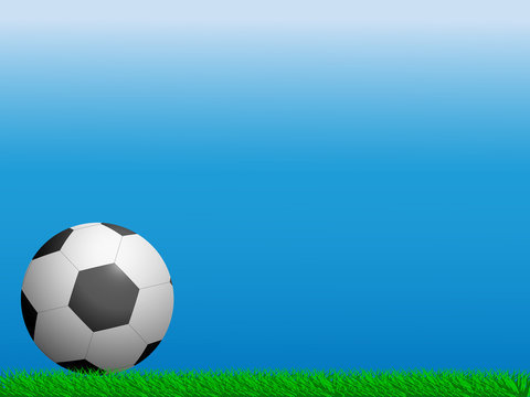 Soccer ball on the grass on a blue background.