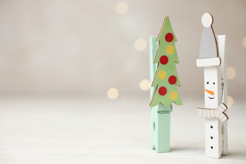 clothespins in form of snowman and Christmas tree