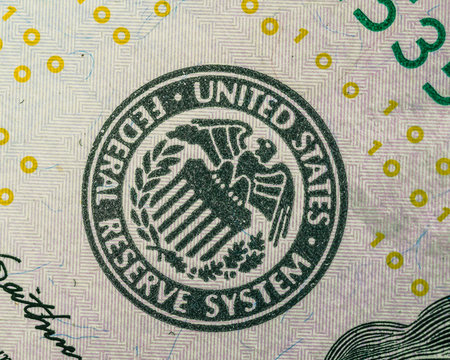 United States Federal Reserve System symbol on dollar bill. Close-up. macro shot.  Finance system concept.