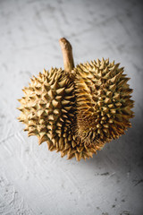 Naklejka na ściany i meble Durian exotic fruit from Asia on concrete table