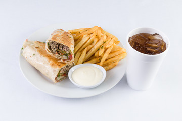 Beef Kafta Kabab Pita Sandwich with fries and soda in Mediterranean Levantine  Cuisine
