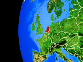 Netherlands from space on realistic model of planet Earth with country borders and detailed planet surface.