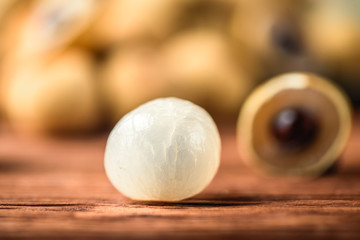 Longan exotic fruits from tropical countries on table. Sweet translucent flesh