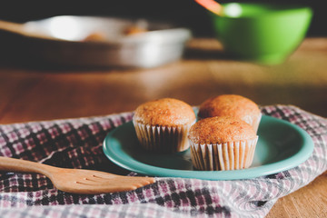 Bakery fresh banana cup cake hot from oven , home made food.
