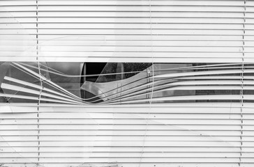 
Broken window with blinds

