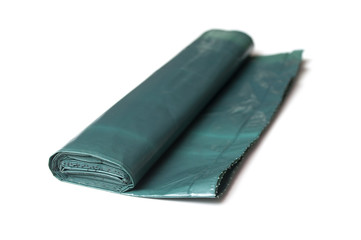 closeup of plastic garbage bag on white background