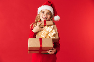 Cheerful little girl wearing Christmas costume