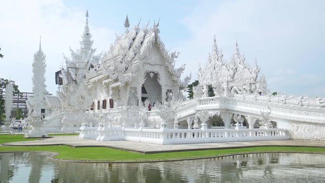 Wat Rong Khun a Buddhist white temple in Thailand. Chiang Rai province. Building exterior.