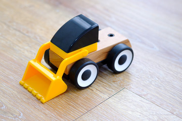 Obraz premium The colorful wooden and plastic car toys ,can assembly and swap for improve the creative thinking.