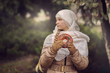 Girl with a scarf in the forest