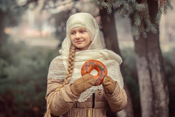 Girl with a scarf in the forest