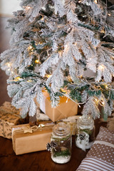 Christmas loft room interior with figures, the New year 2019 decorated with light gifts toys, candles, holiday concept