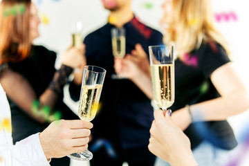 Celebration. Hands holding the glasses of champagne and wine making a toast. The party, celebration, alcohol, lifestyle, friendship, holiday, christmas, new, year and clinking concept