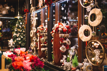 Beautiful colorful christmas shop and house decorations. Flower shop boutique.