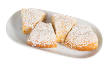 gourmet Epiphany Twelfth Night Cake, Galette des Rois, Cake of the Kings cut into parts