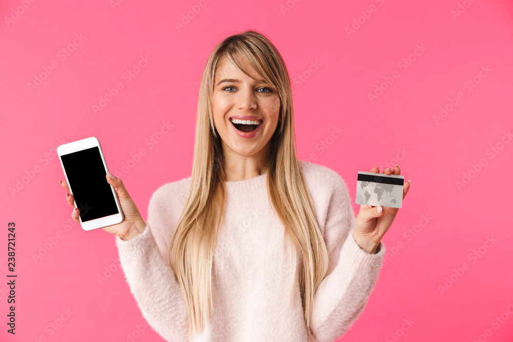 Canvas Prints Cheerful young blonde woman wearing sweater