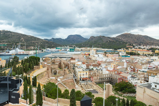 Cartagena, Spain. View of the Roman city theater with sea in the background