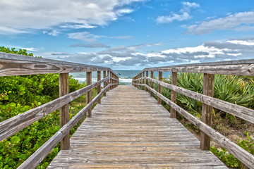 Fototapeta na wymiar Boardwalk to the Beach of Canaveral National Seashore at Cape Canaveral Florida