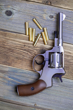 Vintage revolver nagant with seven cartridges