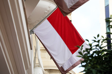 Flag Of Monaco On A Wall In Monaco