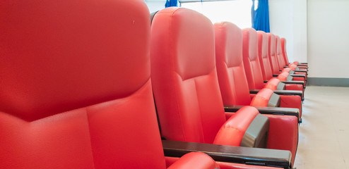 Row Chair red at cinema theater in the afternoon is sunset light