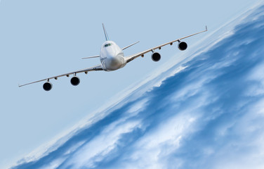 passenger airplane in the clouds. travel by air transport