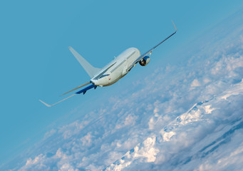 passenger airplane in the clouds. travel by air transport