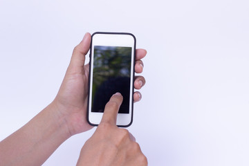 Young girl is using phone with white background,Phone is in hands of woman.