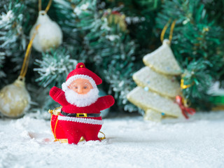 Fototapeta na wymiar Christmas decorative gift boxes, drums and balls isolated on white background, santa claus small toy on white snow,