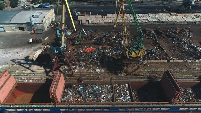 aerial view on Ship loader scrap in harbor,Freight train, ship and scrap metal in port