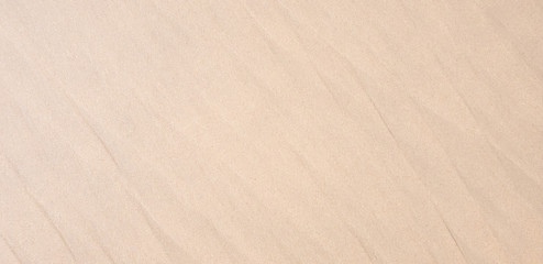 Top view sandy on the beach in Summer background Copy space for your text Shoot photo by smart phone