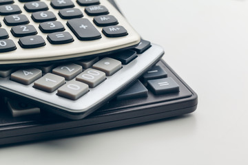 Business still life with calculator on table in office.