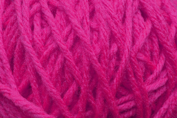 a close up of a pink ball of yarn