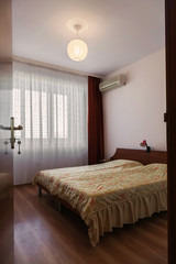 Classic bedroom in the apartment 