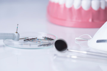 Dentist, Dental tools on a white background, Teeth and jaw.