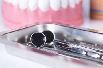 Dentist, Dental tools on a white background, Teeth and jaw.