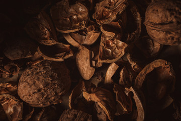 top view of walnut husk as background